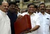 Budget 2013: Karnataka govt offers rice at Rs 2/kg in �please-all� budget